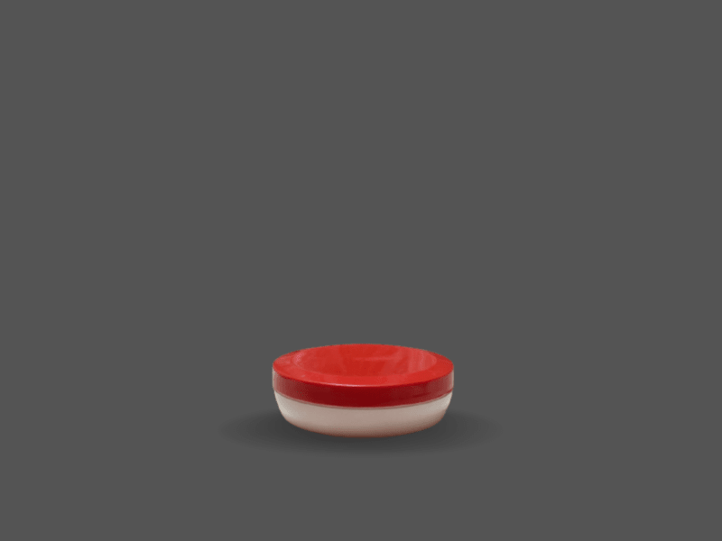 Plastic cream jar with red screw cap